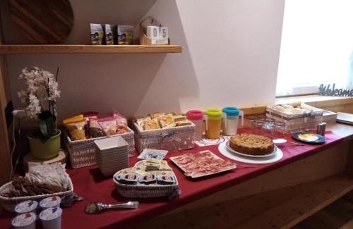 San Nicolo di Comelico Bed & Breakfast | Cozy B&B DeBy with E-Bike Rentals & Family-Friendly Features