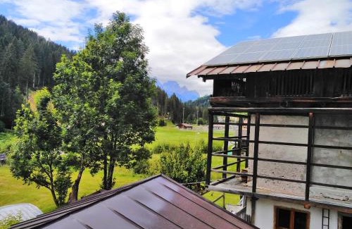 San Nicolo di Comelico Bed & Breakfast | Cozy B&B DeBy with E-Bike Rentals & Family-Friendly Features