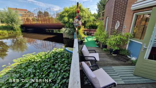 Den Helder Apartment | Discover B&B Duinbrink: Poolside Paradise with Breakfast