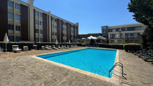 Calenzano Hotel | Oceanfront Bliss at Hotel First: Pet-Friendly & Pool Access