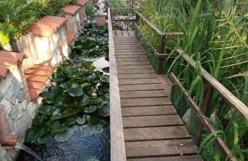 Coppito Bed & Breakfast | Eco-Friendly B&B Il Giardino Acquatico with Hot Tub & Breakfast