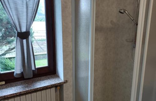 Envie Bed & Breakfast | Inviting B&B Mombracco: Family-Friendly with Kitchen Access