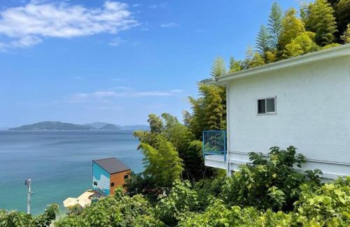 Suooshima House | Beachside bLOCAL AO House: 1 BR with Ocean View Awaits