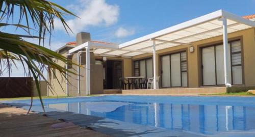 Port Elizabeth Villa | Explore B.R.O.Homes and Villas: Oceanfront Retreat with Pool