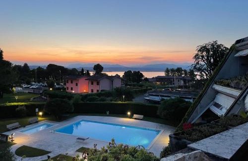Desenzano del Garda Apartment | Cozy B44 Balcony: Family-Friendly Stay with Pool Access