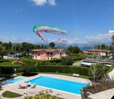 Desenzano del Garda Apartment | Cozy B44 Balcony: Family-Friendly Stay with Pool Access