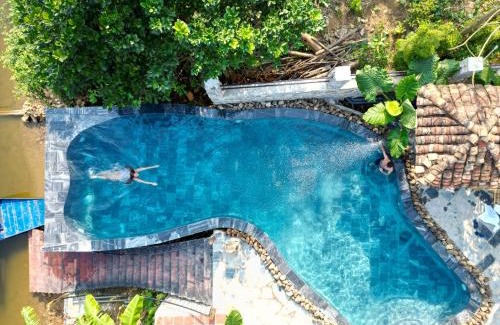 Nam Mau Hotel | Explore Ba Be Jungle Houses: 4-Star Family-Friendly Retreat