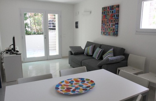 Lignano Pineta Apartment | Modern Carla Apartments - Family-Friendly Retreat Awaits