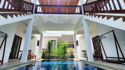 Chaloklum Apartment | Experience Baan Bhuwann: Rated 9.5 with Pool & Kitchen