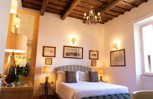 Rione IV Campo Marzio Apartment | Discover Babuino 79: Pet-Friendly Retreat with Breakfast
