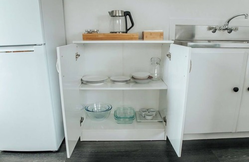 Lake Ferry Cottage | Pet-Friendly Bach 2: Lake Ferry Village Accommodation