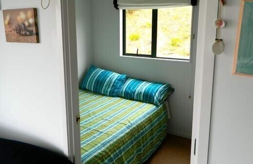 Opito Bay Cottage | Bach With a View - Opito Bay Bach