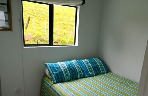 Opito Bay Cottage | Bach With a View - Opito Bay Bach