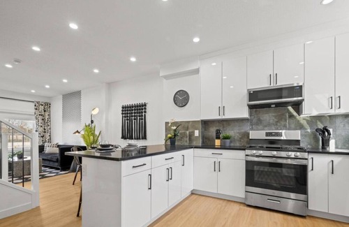 Jasper Place House | Back in Black | Hot Tub | 10 min to WEM | King Bed