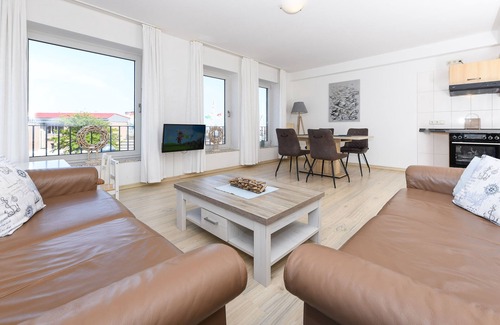 Bensersiel Apartment | Oceanfront Retreat at Backboard - House Harbor View