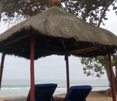 Lome Hotel | Serene Oceanfront Escape at CASE ROBINSON with Private Beach