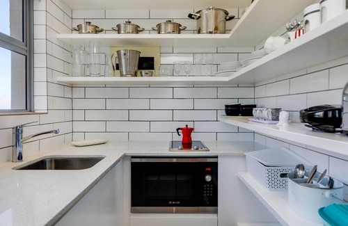 Mouille Point Apartment | Modern Beach Apartment with Ocean Views near V&A