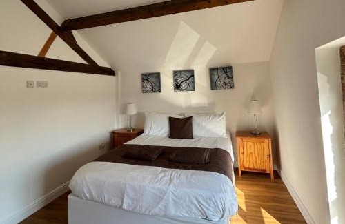 Towcester House | Cozy Family Retreat at Badgers Sett, Tove Valley Cottages