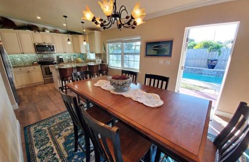 Port Canaveral Apartment | Beautiful Bahamian Cottage with Heated Pool Near the Beach
