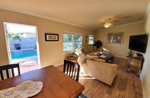 Port Canaveral Apartment | Beautiful Bahamian Cottage with Heated Pool Near the Beach