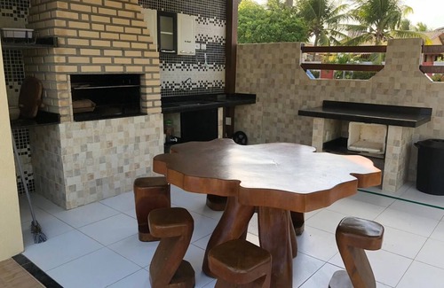 Alto da Cruz House | Discover Bahia Camaçari: Poolside Retreat by Guarajuba