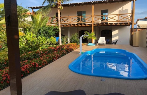 Alto da Cruz House | Discover Bahia Camaçari: Poolside Retreat by Guarajuba
