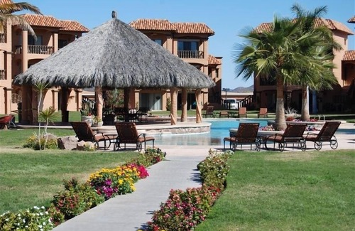 San Carlos Condo | Beachfront Bahia Delfin: Rated 9.6 with Ocean Views & Pool