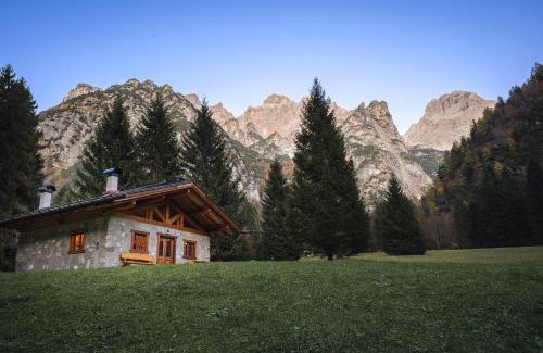 Ragoli Ski Chalet | Pristine Baita Valon - Alpine Hideaway with Family Perks