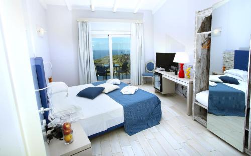 Lu Bagnu Hotel | Peaceful Bajaloglia Resort: Oceanfront Retreat with Pool