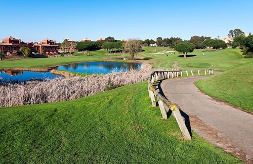 Islantilla Apartment | Charming Garden Retreat at Golf Islantilla for Families