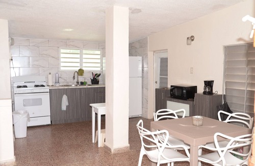 Bajo Apartment | Unwind at Bajos Marina Beach House: Oceanfront Bliss Awaits
