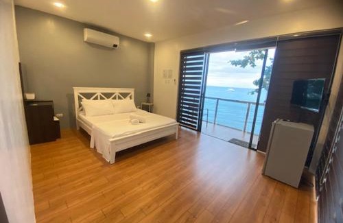 Dauin Bed & Breakfast | Beachfront Baki Divers Resort: Family-Friendly Getaway