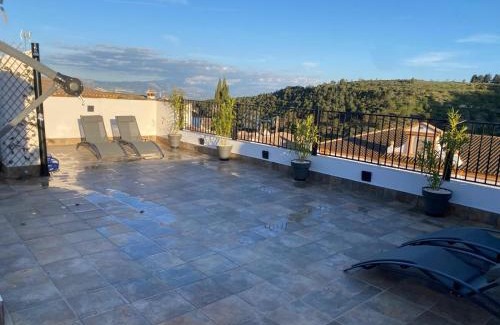 Moclin House | Discover Balcón de la Plaza: Child-Friendly 4-Star Retreat