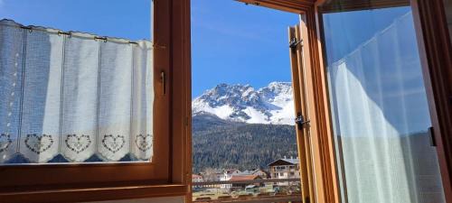 Dosoledo Apartment | Discover Balcone sulle Dolomiti: Family-Friendly Retreat