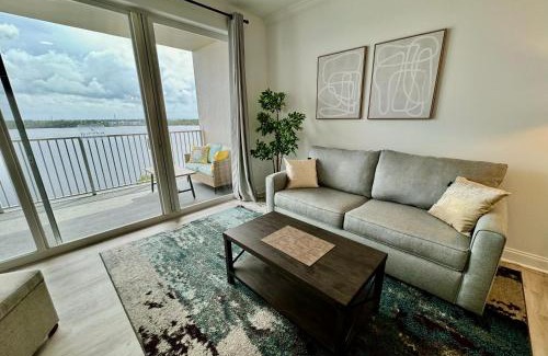 Florida Central Atlantic Coast Apartment | Scenic Balcony King Suite with Lake & Pool Views