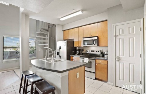 West Campus Apartment | Skyline View with Spiral Staircase Near UT – Guest Favorite!