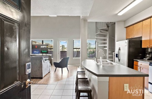 West Campus Apartment | Skyline View with Spiral Staircase Near UT – Guest Favorite!