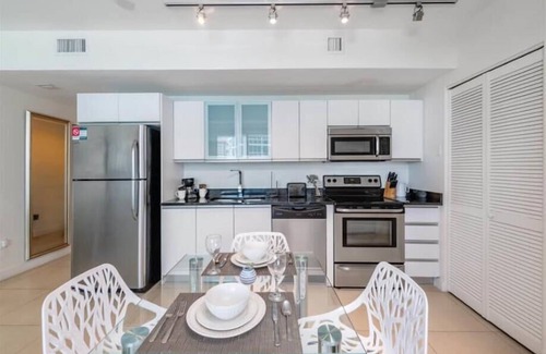 North Beach Apartment | Relaxing Balcony with Ocean Views, Pool & Gym Access