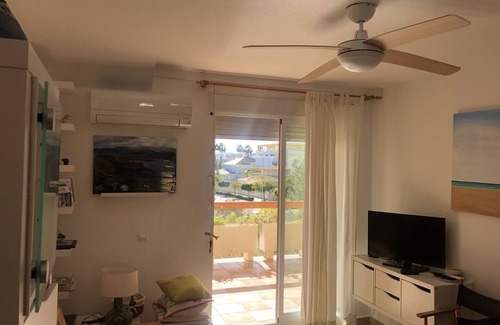 Xeraco Beach Apartment | Family-Friendly Bali 5B: Relax by the Pool & Enjoy Spa