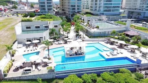 Itacolomi Apartment | Ideal Bali Beach Piçarras Resort with Oceanfront Pool