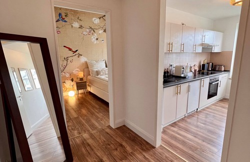 Schoenefeld Apartment | BALI HOME Stylish Apartment with Terrace & Top-Rated Amenities