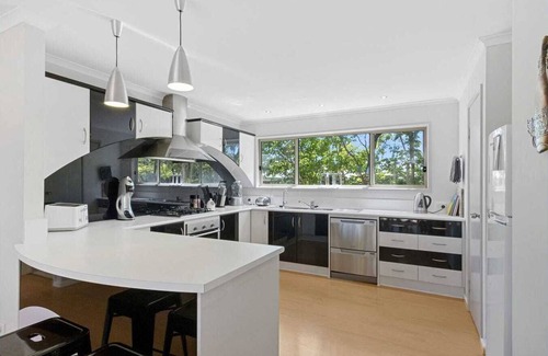 Dalrymple House | Elegant Bali in Wool Bay - Steps to Beach & Ocean Views