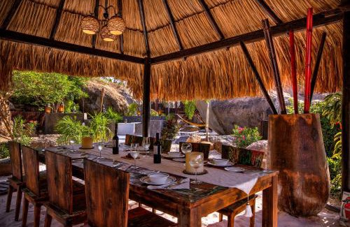 Noord House | Discover Bali Retreat Aruba: Pools, Cinema & Oceanfront Bliss
