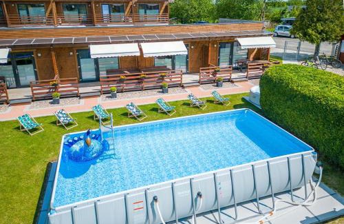 Mielno Cabin | Ocean View Haven at Baltic Resort - Rated 9/10 by Guests