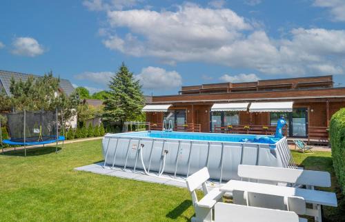 Mielno Cabin | Ocean View Haven at Baltic Resort - Rated 9/10 by Guests