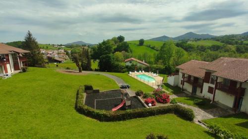Souraide Apartment | Relax at BANCA: Poolside Retreat with Mountain Views