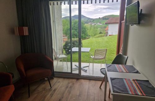 Souraide Apartment | Relax at BANCA: Poolside Retreat with Mountain Views