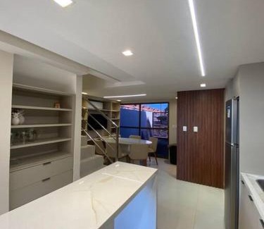 Poco House | Beachfront Bungalow: Pet-Friendly Retreat with Pool