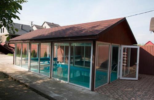Nyzhnje Selyshche House | Explore Banik: Pet Friendly with Pool & Hot Tub Delight