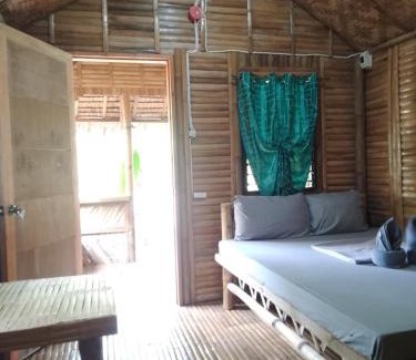 Puerto Princesa Resort | Pet-Friendly Banlaw Garden Resort with Oceanfront Pool